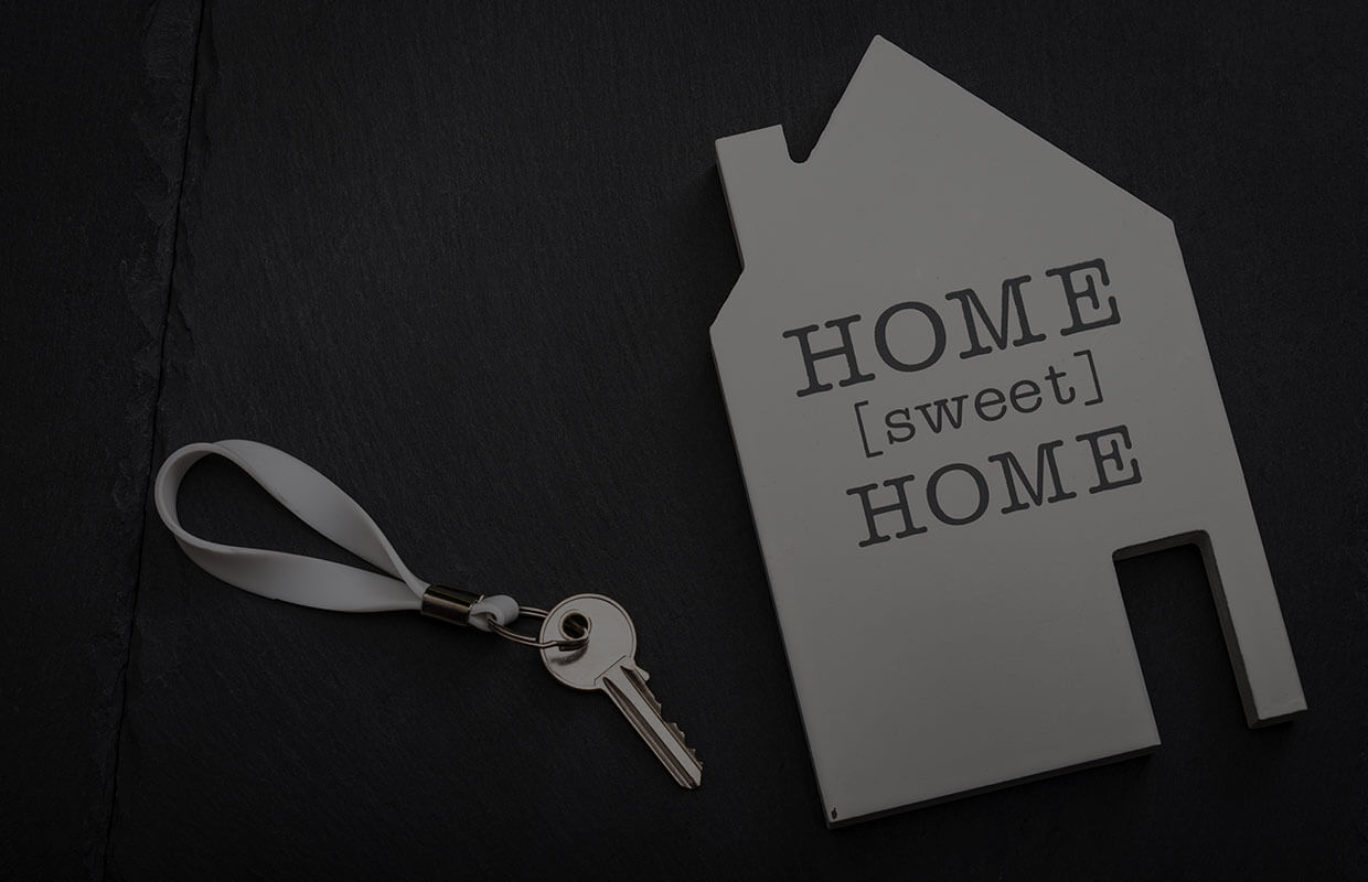 Haustürschlüssel mit Grafik "Home sweet home"