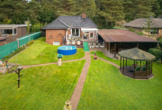 Bild - Auf einer Ebene mit der Natur: Walmdachbungalow mit Gartenpark direkt am Wald in Meppen-Borken!