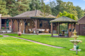 Bild - Auf einer Ebene mit der Natur: Walmdachbungalow mit Gartenpark direkt am Wald in Meppen-Borken!