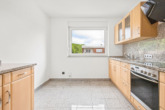 Küche - Gepflegt, aufgewertet, zeitgemäß: 3-Zimmer-Obergeschosswohnung mit Loggia in Meppen-Esterfeld!