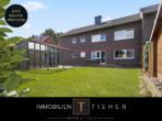 Titelbild - Gartenzeit inklusive – Erdgeschosswohnung mit Wintergarten, Garage und modernisiertem Tageslichtbad