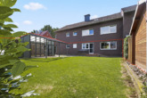 Bild - Gartenzeit inklusive – Erdgeschosswohnung mit Wintergarten, Garage und modernisiertem Tageslichtbad