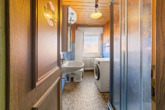 Tageslichtbad Dachgeschosswohnung - Profitables Wohnobjekt: Einfamilienhaus mit zwei vermieteten Wohneinheiten und Gastherme aus 2021!