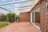 überdachte Terrasse - Klar geplant, modern weitergedacht, klug modernisiert – gepflegte Doppelhaushälfte in Meppen-Nödike!