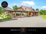 Titelbild - Privatpark statt Schrebergarten – Wohnhaus auf 9.800 m² Grundstück in Twist-Bült!