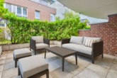 Visualisierung Terrasse - Am Wasser wohnen, in der Tiefgarage parken: Erdgeschosswohnung am Deichort mit Tiefgaragenstellplatz