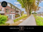 Titelbild - Am Wasser wohnen, in der Tiefgarage parken: Erdgeschosswohnung am Deichort mit Tiefgaragenstellplatz