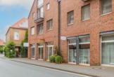 Straßenansicht - Flexibel im Zentrum: Vielseitige Gewerbefläche mit 4 eigenen Parkplätzen in Neuenhaus zu mieten!