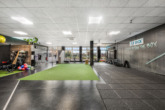 Trainingsfläche rechts - Kraftriegel fürs Anlageportfolio – Vermietete Gewerbefläche im Zentrum von Wallenhorst!